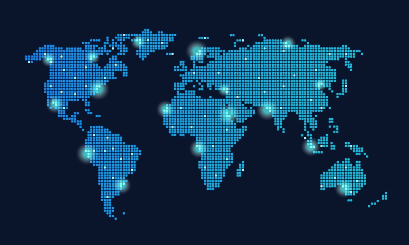 A dark blue background with an image of the world constructed of pale blue blocks in a map layout, with bright light blips on various points in different countries.