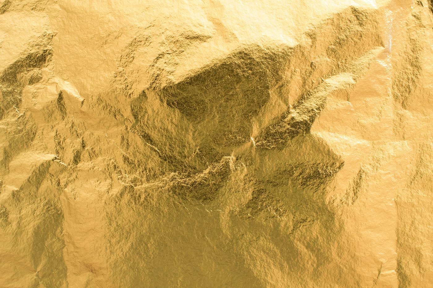 A photo of a piece of gold leaf foil.